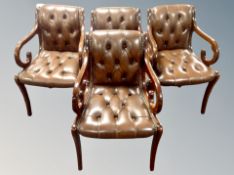 A reproduction set of four mahogany armchairs in Regency style upholstered in chestnut brown