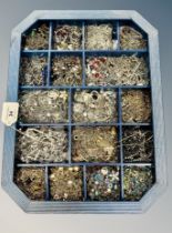 A display box containing a large quantity of costume chains and necklaces (Q)