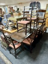 An oak pull out extending dining table,