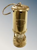 A brass Lamp & Limelight miner's lamp