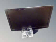 An LG 42 inch LCD TV with lead and remote