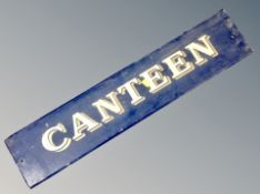 A painted wooden canteen sign,