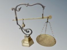 A Victorian brass pan scale,