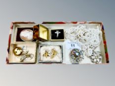 A cameo brooch together with costume jewellery, white metal crucifix ring,