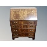 A George III style mahogany bureau,