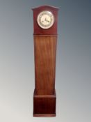 A mahogany grandmother clock,
