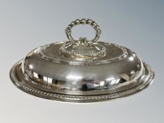 A silver plated lidded entrée dish,