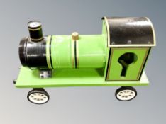 A painted wooden model of a train,
