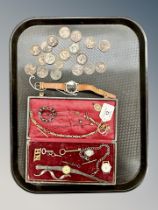 An antique pocket watch chain together with Victorian copper coins, buckle,