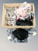 A box of bucket hats, sleep eye protectors, ear warmers,