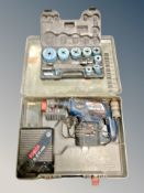 A Bosch 24v drill in case with lead and charger together with Erbauer hole saw set