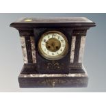A late Victorian marble and black slate eight day mantel clock,