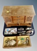 A wooden jewellery chest and contents, pearls, costume jewellery, lady's and gent's watches,