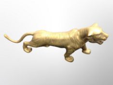 A brass figure of a tiger,