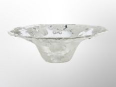 A large glass fruit bowl,