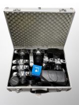 An aluminium camera case containing assorted cameras, Pentax MEF cameras (x 3),