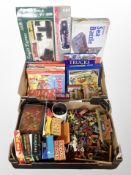 Two boxes of die cast plastic farm animals, vintage games, children's annuals, Top Trumps sets,