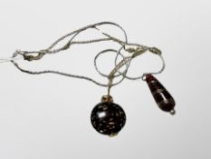 An Italian glass pendant with aventurine inclusions and a similar tear drop pendant on chain