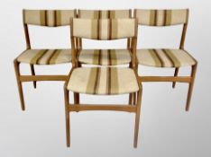 A set of four Erik Buch designed teak framed dining chairs in striped upholstery
