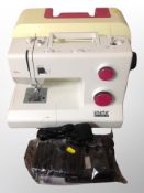 A Smarter by Pfaff electric sewing machine with lead and pedal