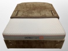 A 4'6 divan base with Octasmart mattress and headboard