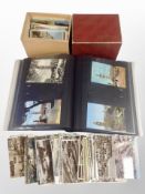 An album and two boxes of 20th century colour and monochrome postcards