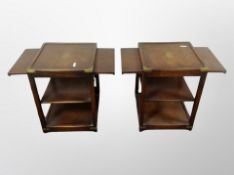 A pair of mahogany brass mounted campaign style lamp tables with pull-out slides,