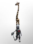 A large wooden figure of a giraffe, height 150 cm,