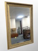 A Victorian style gilt bevelled mirror,