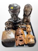 Seven items of African/Indonesian carvings including busts,