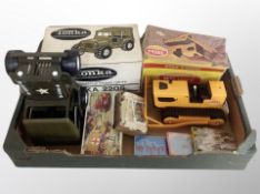 A box of Tonka jeep, boxed bulldozer model, box of cigarette cards,