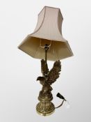 An ornate gilt brass eagle lamp base (a/f) CONDITION REPORT: Break just below the