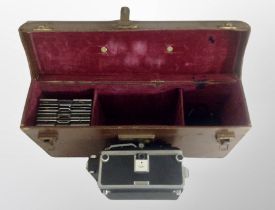 A Micro Precision Products 5x4 plate camera in leather carry case with several 5 x 4 film holders