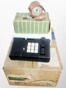 An Eversure Chronostamp in original box together with a vintage adding machine