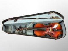 An early 20th century violin with two-piece 14" back,
