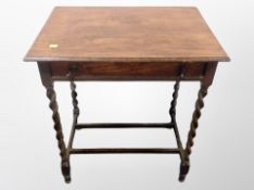 An Edwardian oak barley twist side table fitted a drawer,