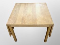 A Danish blond oak drop leaf occasional table,