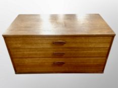 A 1970's teak three drawer low chest,