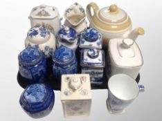 A collection of Ringtons ceramics including blue and white caddies, Ringtons biscuit barrel teapot,