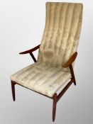 A Danish teak framed armchair upholstered in 'sheepskin' fabric