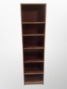 A 1970's Danish rosewood-effect open bookcase, width 51 cm,