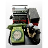 A vintage plastic telephone, a pair of Vespa 10 x 50 binoculars,