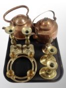 Two copper kettles, two pairs of brass candlesticks,
