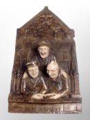 A French glazed ceramic wall plaque entitled 'Les Chanters',