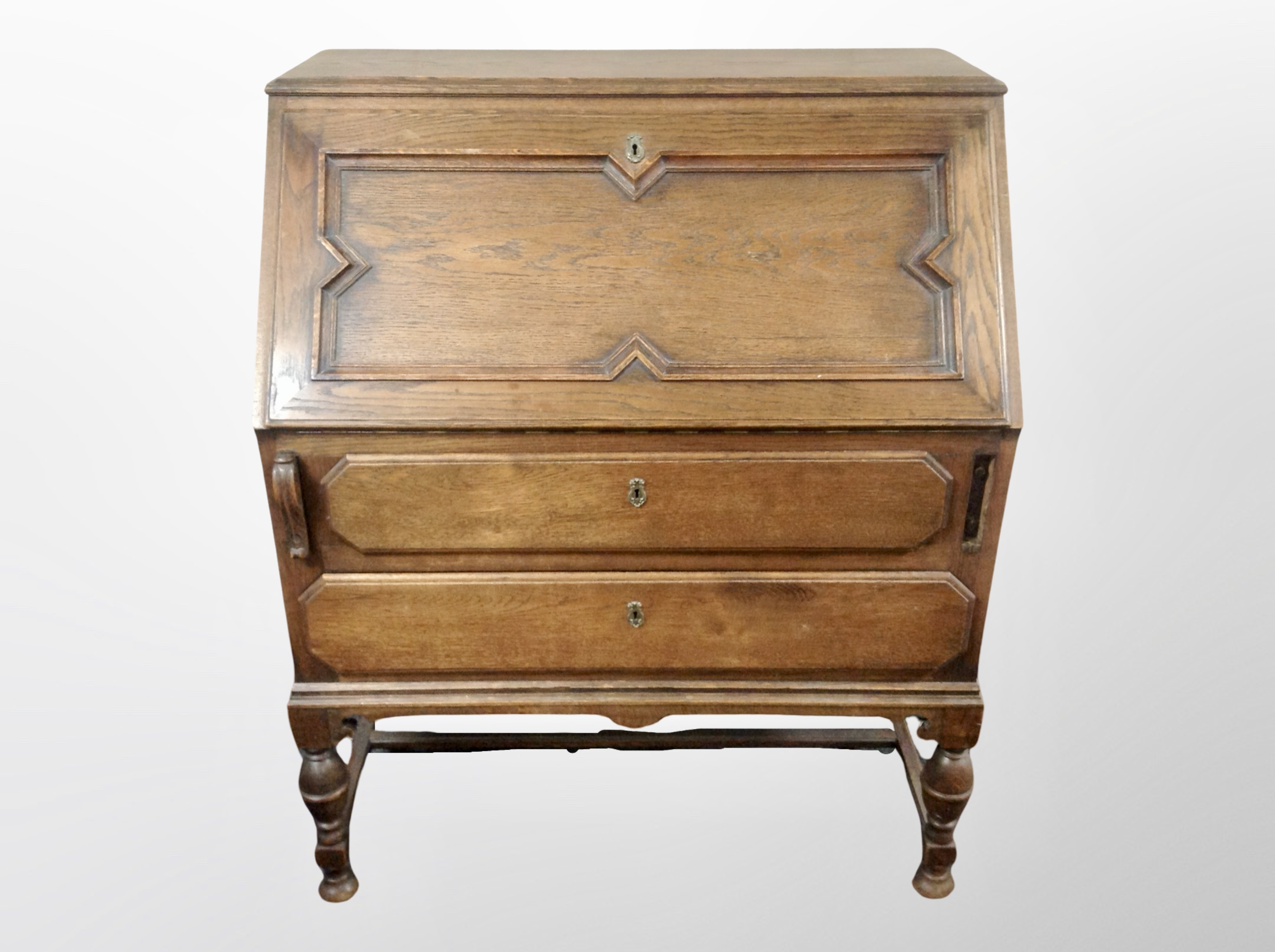 An early 20th century oak fall fronted writing bureau,