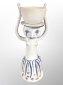 A Danish blue and white earthenware figural vase in the style of Bjorn Wiinblad,