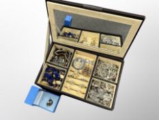 A jewellery box containing silver and niello ring, other dress rings,