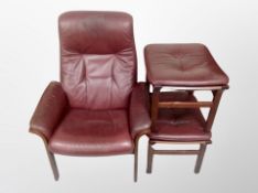 A 1970's Danish stained beech framed armchair in Burgundy leather upholstery together with two