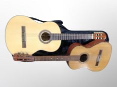 A Santana classical acoustic guitar in carry bag and one further guitar