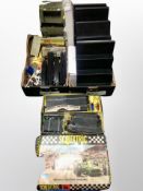 A Scalextric racing set and two further boxes of track, related accessories,